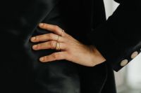 Kaboompics - Woman's Ringed Hand Across Black Blazer