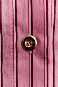 Kaboompics - Pink Striped Cotton Shirt with Gold Button Detail