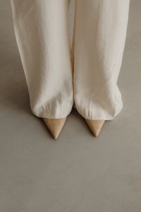 Kaboompics - Pointed Beige Heels with Flowing White Trousers