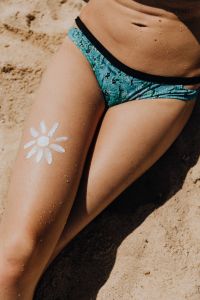 Kaboompics - Macro Close-Up of White Sun Body Paint on a Tanned Thigh
