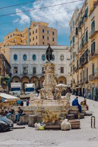 Kaboompics - Piazza dei Martiri Fountain With Scooters and Pedestrians in Naples