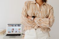 Kaboompics - Woman Standing beside Home Office Desk in Striped Blouse