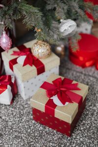 Kaboompics - Red and Gold Presents under a Christmas Tree