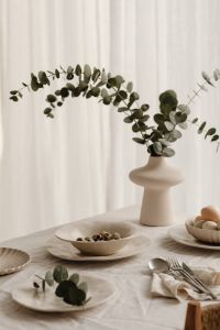 Neutral Easter Table Setting With Pastel Eggs, Eucalyptus And Bunny Decor