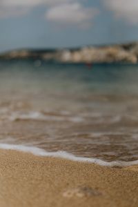 Kaboompics - Minimal Beach Sand And White Foam Line
