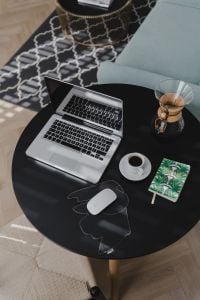 Contemporary Living Room Home Office: Laptop, Coffee and Minimal Work-from-Home Lifestyle