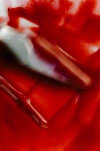 Kaboompics - Red Lip Gloss and Applicator Close Up