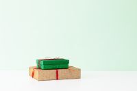 Kaboompics - Green and Kraft Gift Boxes on Mint Green Background