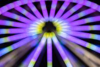 Kaboompics - Purple Ferris Wheel Spokes with Yellow Bokeh Lights
