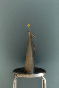 Kaboompics - Metal Sculpture on Chrome Stool
