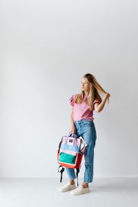 Kaboompics - Girl Carrying Colorful School Backpack