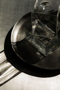 Kaboompics - Glass Cube and Ice on Chrome Tray