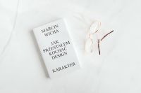Kaboompics - White Book And Gold Eyeglasses On White Marble
