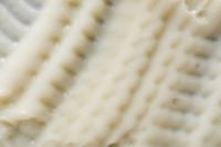 Kaboompics - Thick Cream Texture Pattern with Repeating Lines Close-Up