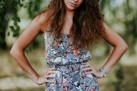 Kaboompics - A woman with long brown hair in a dress