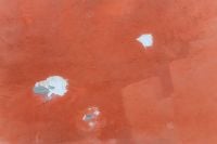 Kaboompics - Red Painted Wall with Peeling White Paint