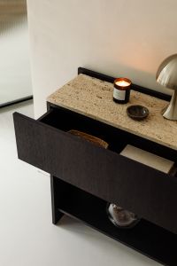 Kaboompics - Black Console with Open Drawer, Travertine Top, Dome Lamp and Candle