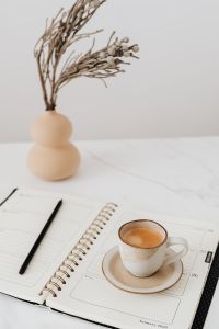 Kaboompics - Coffee - Weekly Planner & Vase on Marble