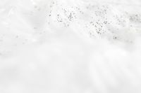 Kaboompics - Wide White Skincare Foam Background with Dark Speckles Concentrated Along the Top
