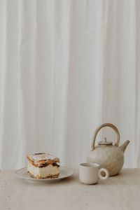 Kaboompics - Napoleonka Cream Cake with White Teapot and Cup on Neutral Linen