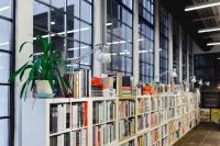 Kaboompics - Rows of different colorful books lying on the shelves in the modern urban bookshop