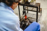 Kaboompics - Glassmaker Shaping Molten Glass on a Blowpipe in the Murano Workshop