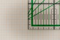 Kaboompics - Green L Shaped Ruler on Grid Paper