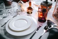 Kaboompics - Amber Glass, White Plate and Christmas Decor in Soft Focus