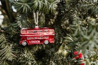 Kaboompics - Red London Bus Ornament Surrounded by Christmas Tree Needles