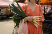 Kaboompics - Woman Choosing Rhubarb and Fresh Fruit
