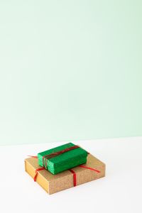 Kaboompics - Cropped Green Gift Box and Wrapped Presents with Copy Space