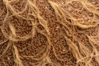 Kaboompics - Gold Beaded Textile with Soft Fibers