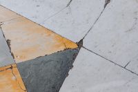 Kaboompics - Diagonal Cream, Ochre and Slate Marble Slabs, Geometric Naples Italy Stone Floor Background