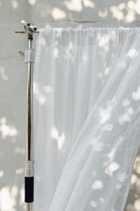 Kaboompics - White Linen Curtains with Soft Vertical Folds