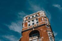 Kaboompics - Madrid Red Brick Facade with White Stone Details and Arched Windows