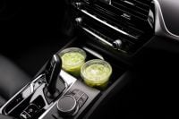 Kaboompics - Two Matcha Drinks in a Luxury Black Car Interior
