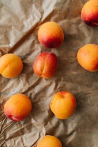 Apricot Still Life on Crumpled Kraft Paper: Rustic Summer Fruit Backgrounds for Recipes and Market Design