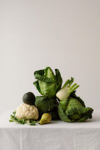 Kaboompics - Cropped Green Vegetable Arrangement on Light Background, Copy Space