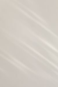 Kaboompics - Minimal Sunlight Beam on White Wall Background