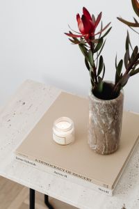 Kaboompics - Candle and Tall Textured Vase on Travertine