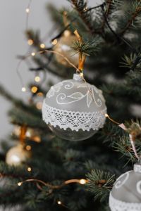 Kaboompics - Vertical Close-Up of White Lace Christmas Ornament