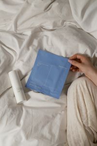Kaboompics - Beauty Product UGC Mockup On White Bed Sheets