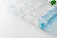 Kaboompics - Clear and Blue Plastic Bottles Lying Side by Side