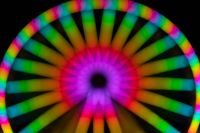 Kaboompics - Rainbow Ferris Wheel Rim with a Purple Center Glow
