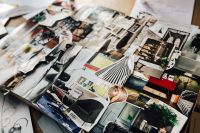 Kaboompics - Designers working with material samples and paper cutouts