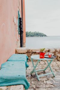 Kaboompics - Seaside Courtyard with Red Coffee Set and Adriatic View