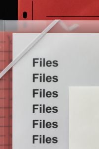 Kaboompics - Red File Folder Close Up with Bold Editorial Typography