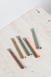 Kaboompics - Pastel Chalk Sticks with Open Space on Textured Neutral Stone for School and Learning Graphics