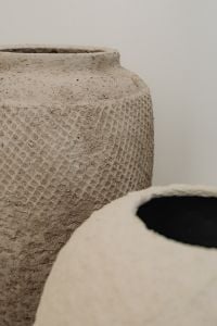 Kaboompics - Close-Up Rough Beige Ceramic Vase with Neutral Copy Space