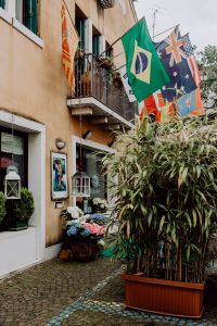 Kaboompics - Residential houses with arches & flags